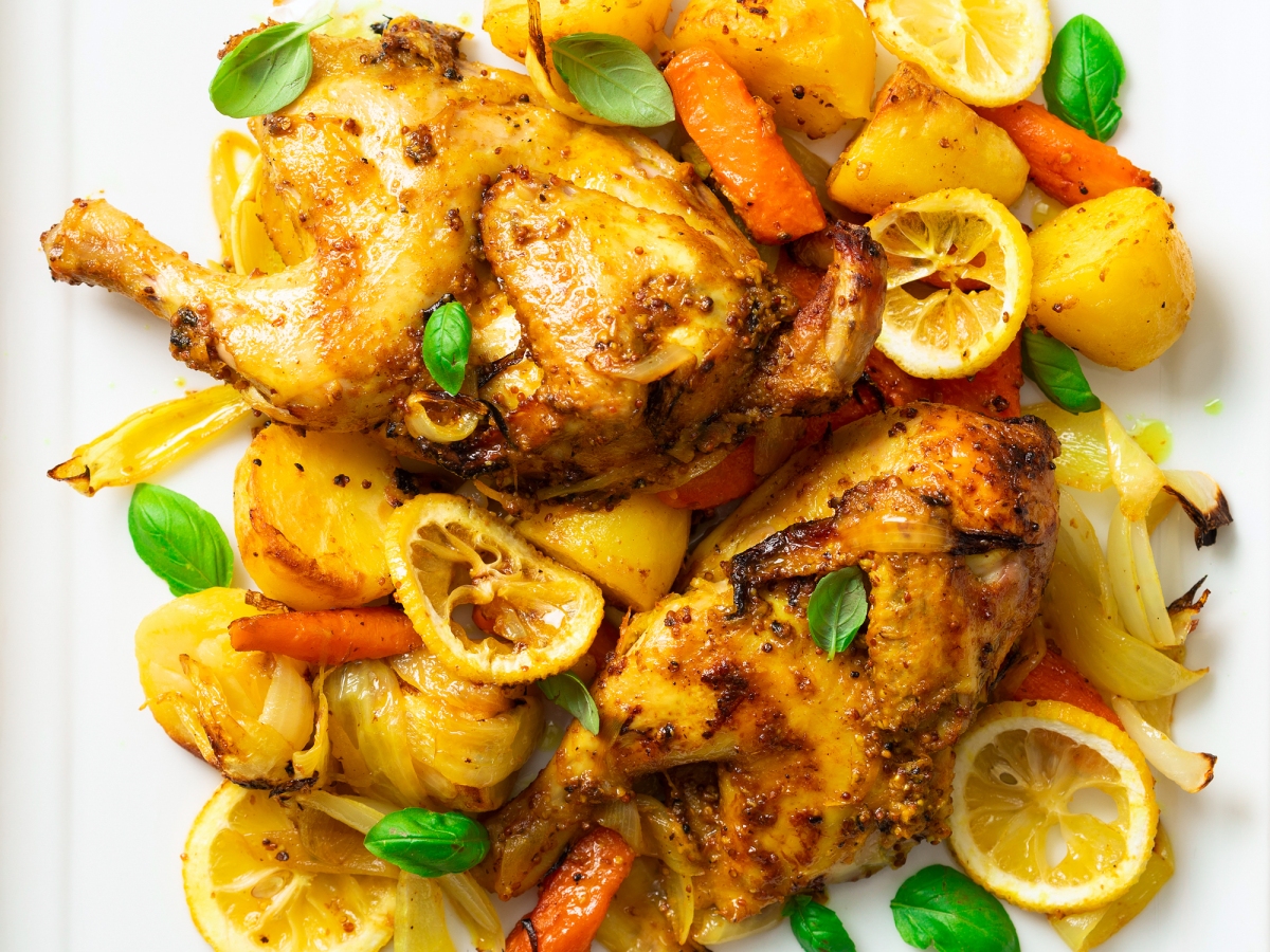 POUSSIN CHICKEN WITH BAKED POTATOES, CARROTS, AND&nbsp;LEMON