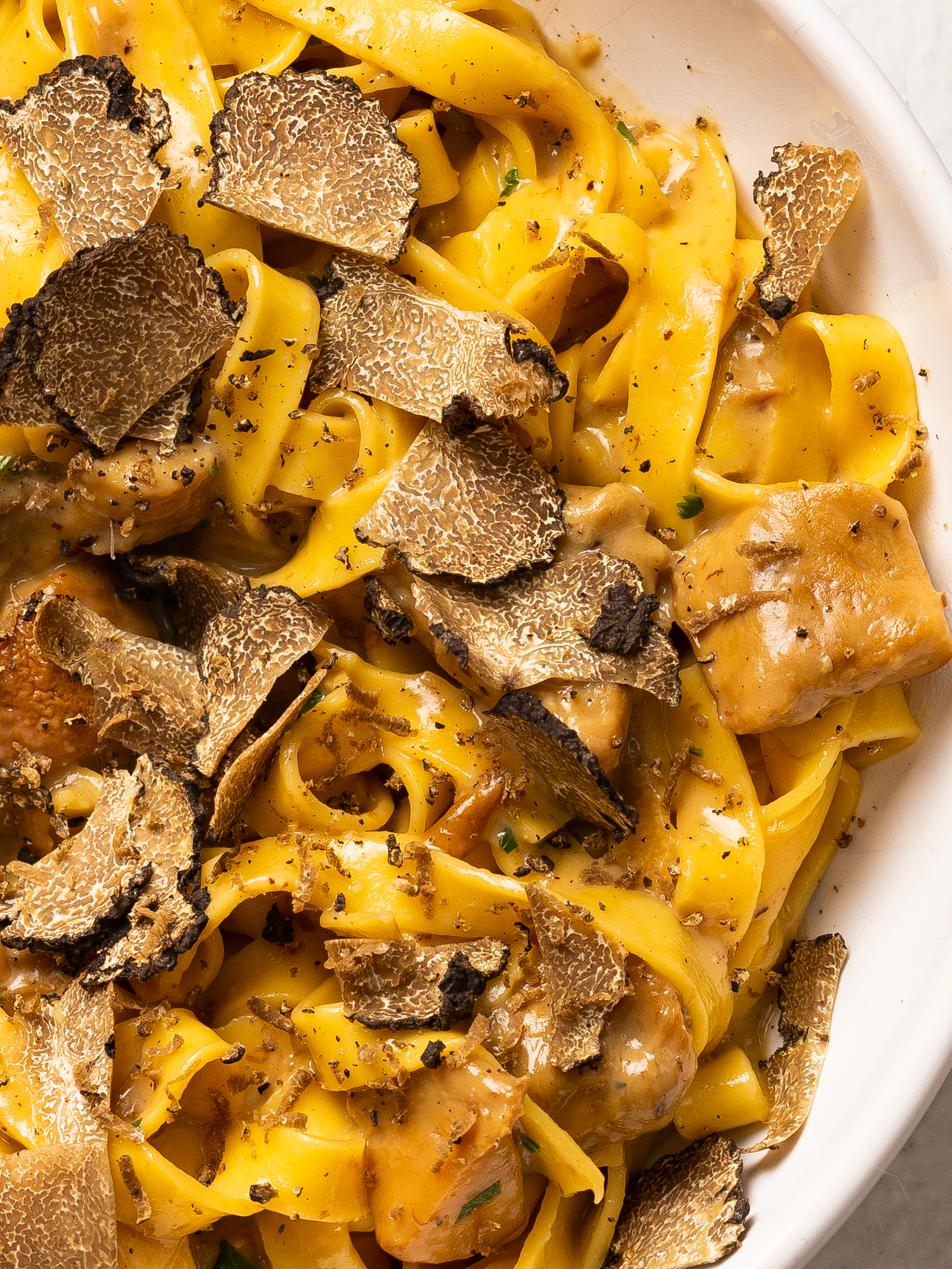TAGLIATELLE WITH TRUFFLES AND PORCINI MUSHROOMS